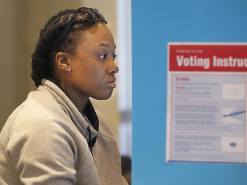 Aadilah Siddeeq votes using an electronic voting machine at a polling place in the Bronzeville neighborhood of Chicago in the Illinois primary. Aadilah Siddeeq votes using an electronic voting machine at a polling place in the Bronzeville neighborhood of Chicago in the Illinois primary.