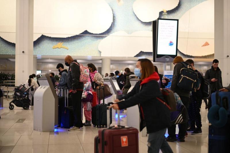 Travelers wear masks at LaGuardia Airport in New York City on Tuesday as concern grows worldwide over omicron, the newest coronavirus variant. Minnesota confirmed the second U.S. omicron case on Thursday, and Colorado the third. Travelers wear masks at LaGuardia Airport in New York City on Tuesday as concern grows worldwide over omicron, the newest coronavirus variant. Minnesota confirmed the second U.S. omicron case on Thursday, and Colorado the third.