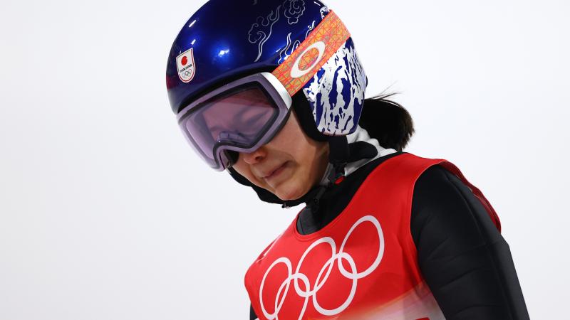 Sara Takanashi of Team Japan shows dejection after being disqualified after jumping in the final round of the mixed-team ski jumping event at the National Ski Jumping Center in Zhangjiakou, China. Sara Takanashi of Team Japan shows dejection after being disqualified after jumping in the final round of the mixed-team ski jumping event at the National Ski Jumping Center in Zhangjiakou, China.
