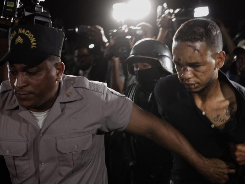 Eddy Vladimir Feliz Garcia, the alleged getaway driver in the shooting of ex-Boston Red Sox slugger David Ortiz, is escorted to court in Santo Domingo, Dominican Republic. Eddy Vladimir Feliz Garcia, the alleged getaway driver in the shooting of ex-Boston Red Sox slugger David Ortiz, is escorted to court in Santo Domingo, Dominican Republic.