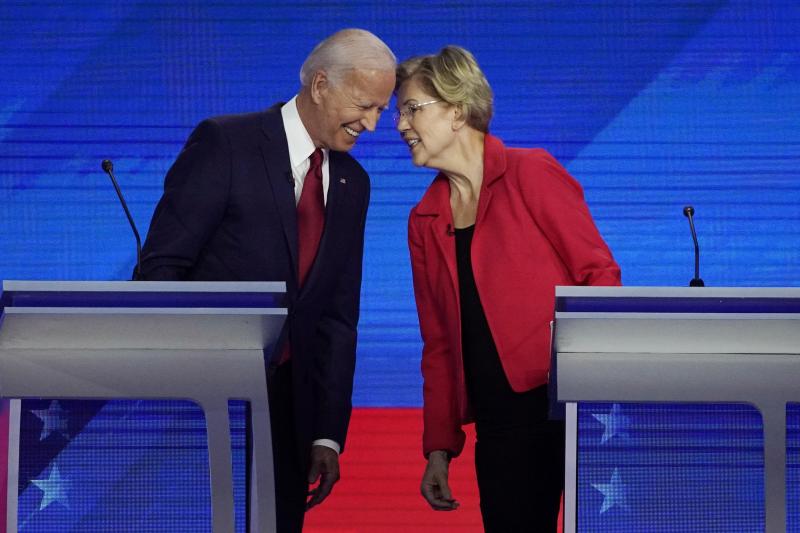 Democratic presidential candidates Joe Biden and Sen. Elizabeth Warren, D-Mass., connect before the September Democratic presidential primary debate. Democratic presidential candidates Joe Biden and Sen. Elizabeth Warren, D-Mass., connect before the September Democratic presidential primary debate.