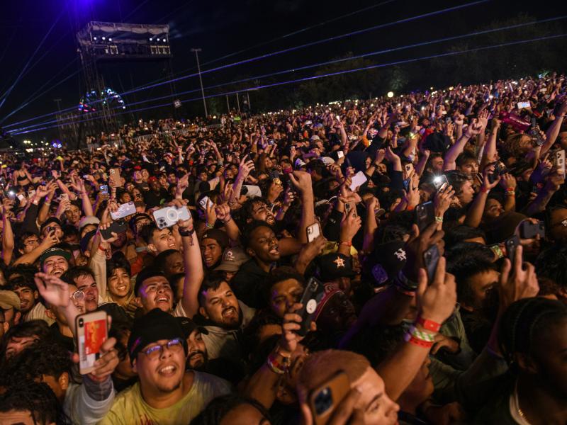 The crowd watches as Travis Scott performs at the Astroworld Festival at NRG park on Friday, in Houston. The crowd watches as Travis Scott performs at the Astroworld Festival at NRG park on Friday, in Houston.