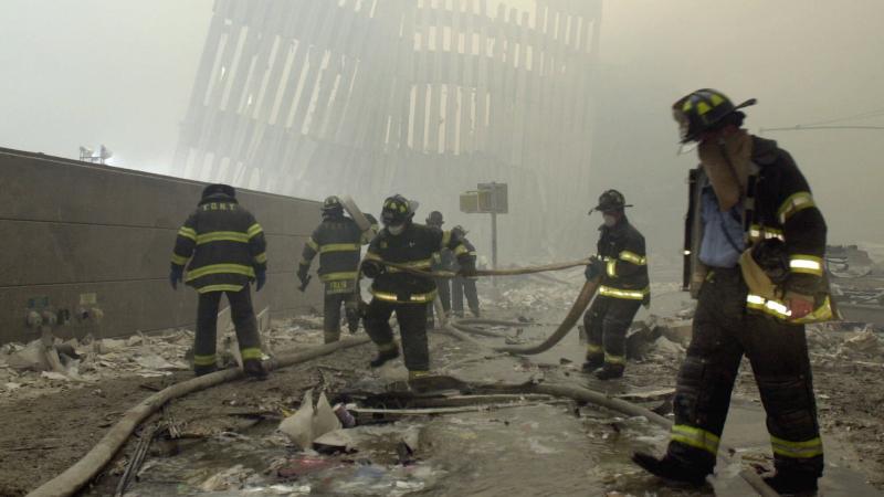 Firefighters work at Ground Zero, the site of the World Trade Center attacks, on Sept. 11, 2001. Firefighters work at Ground Zero, the site of the World Trade Center attacks, on Sept. 11, 2001.