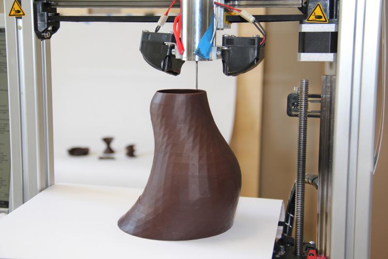 For 3-D food printers, chocolate is a good material to start with, because it's fairly simple to make it liquid inside the printer cartridge and solid once it drops out. For 3-D food printers, chocolate is a good material to start with, because it's fairly simple to make it liquid inside the printer cartridge and solid once it drops out.