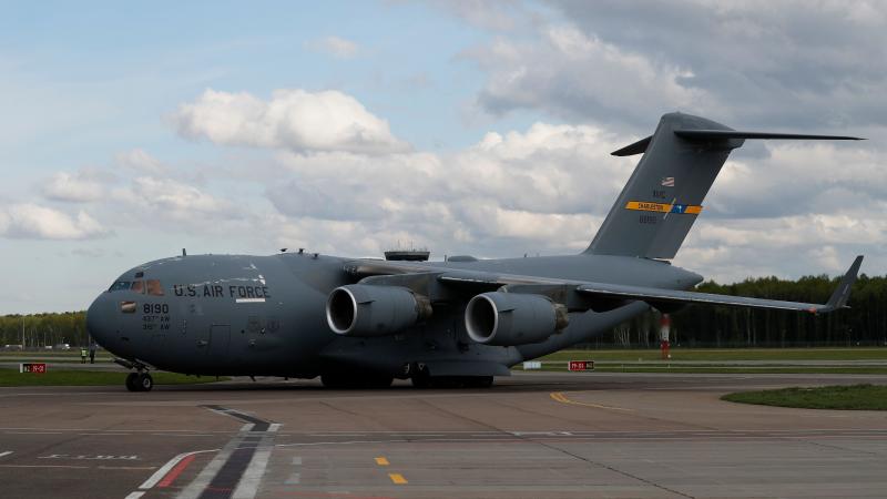 A U.S. Air Force C-17 Globemaster transport plane carrying medical supplies lands in Moscow in May 2020. The same type of plane airlifted refugees from Afghanistan this past week — one of whom gave birth on the aircraft. A U.S. Air Force C-17 Globemaster transport plane carrying medical supplies lands in Moscow in May 2020. The same type of plane airlifted refugees from Afghanistan this past week — one of whom gave birth on the aircraft.