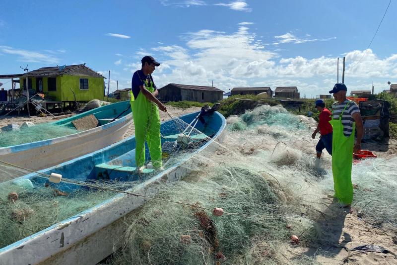 Mexican fishermen tend to their nets on Bagdad Beach, just south of the Texas-Mexico border. Red snapper poaching along the Gulf is a multi-million dollar black market. Mexican fishermen tend to their nets on Bagdad Beach, just south of the Texas-Mexico border. Red snapper poaching along the Gulf is a multi-million dollar black market.
