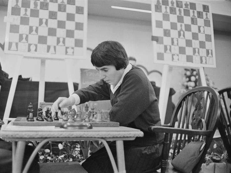Georgian chess champion Nona Gaprindashvili plays at the International Chess Congress in London on Dec. 30, 1964. She is suing Netflix for defamation and invasion of privacy over its series The Queen's Gambit. Georgian chess champion Nona Gaprindashvili plays at the International Chess Congress in London on Dec. 30, 1964. She is suing Netflix for defamation and invasion of privacy over its series The Queen's Gambit.