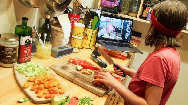 Wiley James, 10, prepares a meal as part of an online cooking camp run by a chef in Austin, Texas. Wiley James, 10, prepares a meal as part of an online cooking camp run by a chef in Austin, Texas.