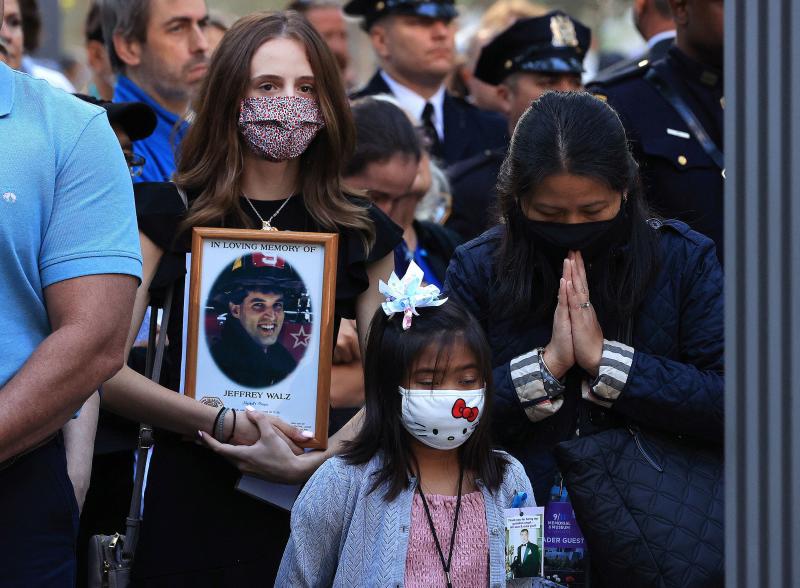Family members and loved ones of victims of those who died on 9/11 attend the 20th anniversary commemoration ceremony on Saturday at the National September 11 Memorial & Museum in New York City. Family members and loved ones of victims of those who died on 9/11 attend the 20th anniversary commemoration ceremony on Saturday at the National September 11 Memorial & Museum in New York City.