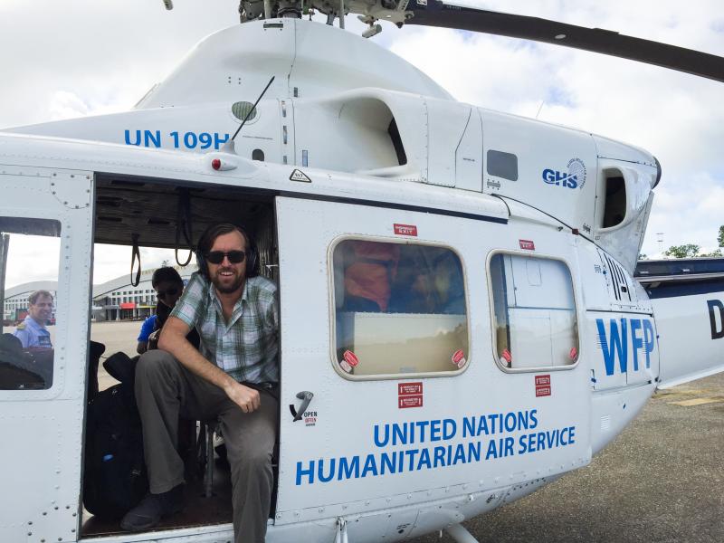 Dr. Eugene Richardson in a helicopter during the Ebola outbreak in Sierra Leone, where he worked as a clinical lead for Partner in Health's response to the outbreak. He is the author of the new book Epidemic Illusions: On the Coloniality of Global Public Dr. Eugene Richardson in a helicopter during the Ebola outbreak in Sierra Leone, where he worked as a clinical lead for Partner in Health's response to the outbreak. He is the author of the new book Epidemic Illusions: On the Coloniality of Global Public