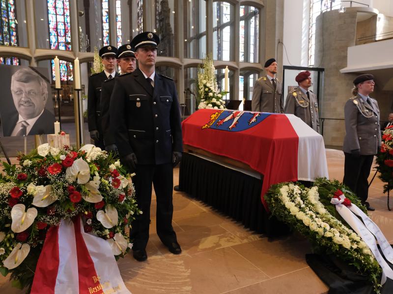 An honor guard stands at the coffin of assassinated German politician Walter Lübcke at his memorial service on June 13 in Kassel, Germany. Lübcke, a Christian Democrat, was outspoken in his pro-immigration views. His confessed killer is an avowed neo-Na An honor guard stands at the coffin of assassinated German politician Walter Lübcke at his memorial service on June 13 in Kassel, Germany. Lübcke, a Christian Democrat, was outspoken in his pro-immigration views. His confessed killer is an avowed neo-Na