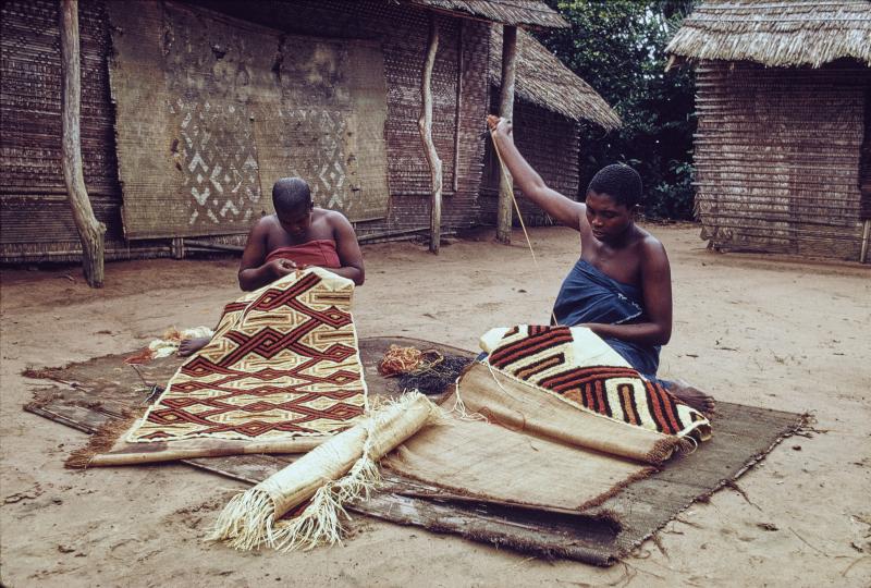 Kuba women decorating woven cloth in the Democratic Republic of the Congo, photographed in 1970. In the past, women were the main creators of the legendary Kuba textiles. Kuba women decorating woven cloth in the Democratic Republic of the Congo, photographed in 1970. In the past, women were the main creators of the legendary Kuba textiles.