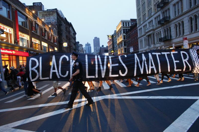 A police officer patrols during a protest in support of the Black Lives Matter movement in New York City on July 9. A police officer patrols during a protest in support of the Black Lives Matter movement in New York City on July 9.