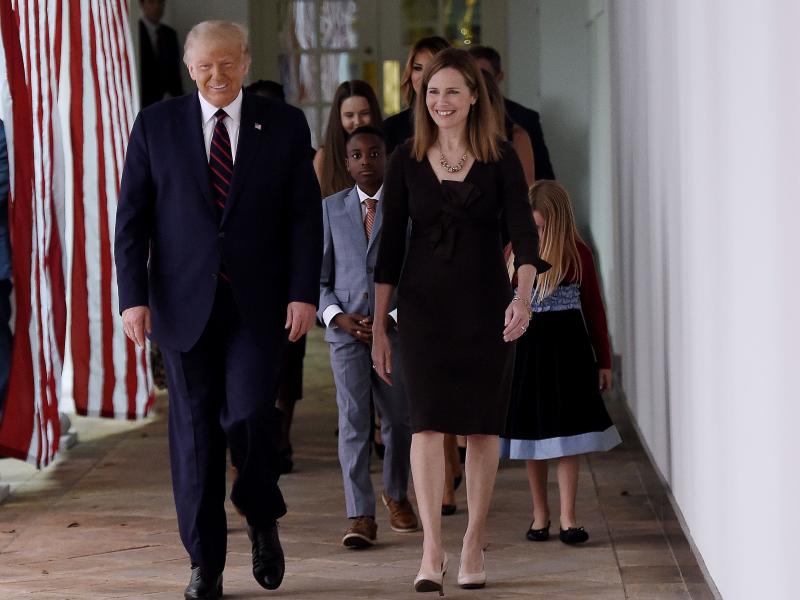 President Trump and Judge Amy Coney Barrett walk to the Rose Garden of the White House on Saturday. President Trump and Judge Amy Coney Barrett walk to the Rose Garden of the White House on Saturday.