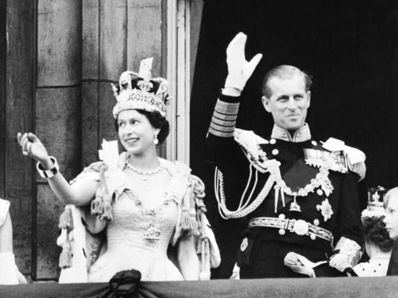 Queen Elizabeth II and Prince Philip wave to the crowd after her coronation at Westminster Abbey in London on June 2, 1953. Queen Elizabeth II and Prince Philip wave to the crowd after her coronation at Westminster Abbey in London on June 2, 1953.