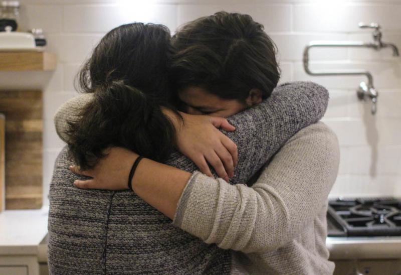 Maria Rivas and her 15-year-old daughter, Emily, embrace after their StoryCorps interview last month. Maria Rivas and her 15-year-old daughter, Emily, embrace after their StoryCorps interview last month.