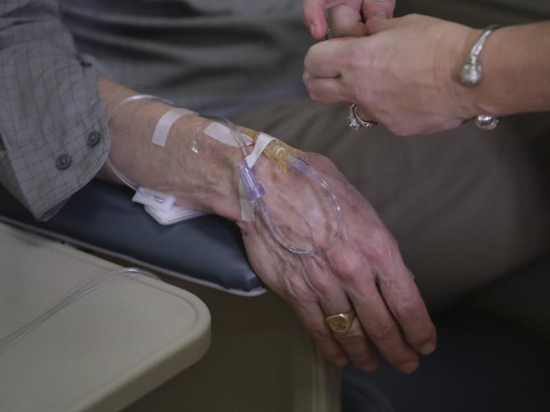 As part of a clinical study, a patient with Alzheimer's disease receives an infusion of aducanumab at a Providence, R.I., hospital in 2019. Aducanumab is being marketed as Aduhelm. As part of a clinical study, a patient with Alzheimer's disease receives an infusion of aducanumab at a Providence, R.I., hospital in 2019. Aducanumab is being marketed as Aduhelm.