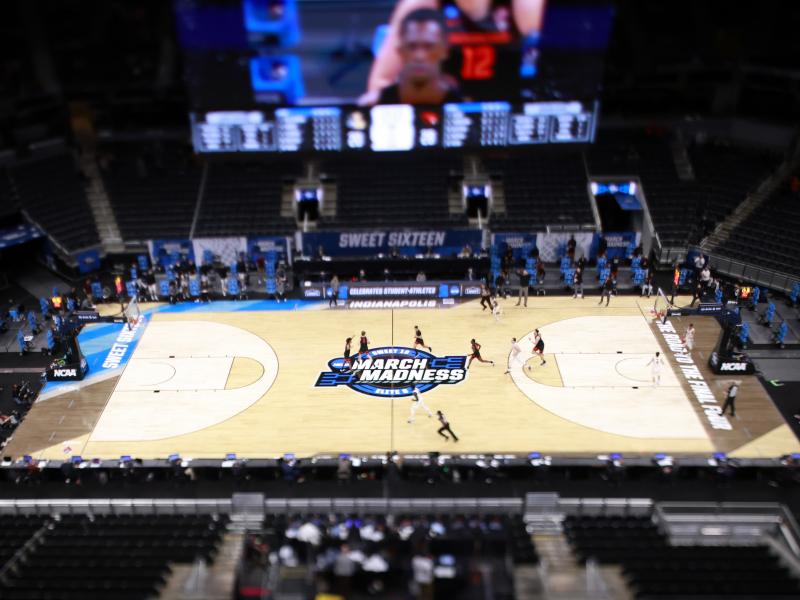 The March Madness logo on the court during the Sweet Sixteen round of the 2021 NCAA Men's Basketball Tournament in Indianapolis. Soon, some college athletes can get money when using their name, image or likeness. The March Madness logo on the court during the Sweet Sixteen round of the 2021 NCAA Men's Basketball Tournament in Indianapolis. Soon, some college athletes can get money when using their name, image or likeness.