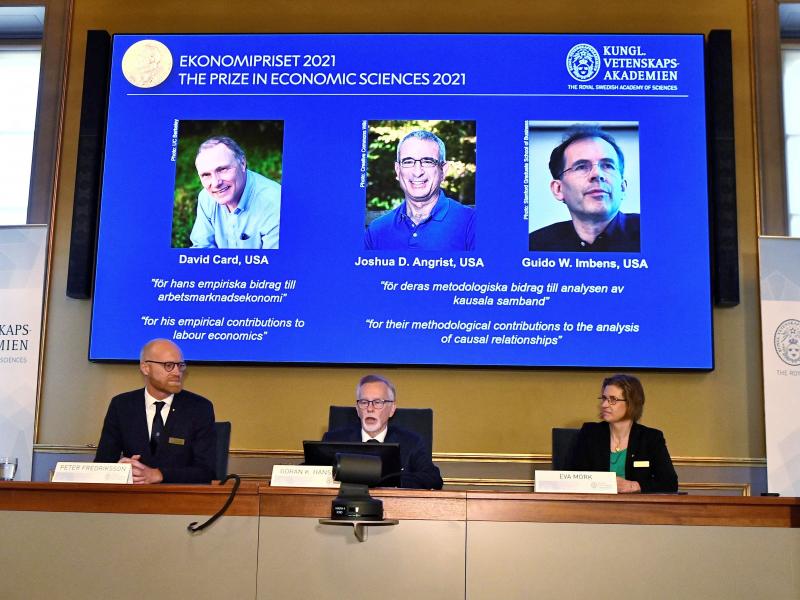 Goran K. Hansson (C), Permanent Secretary of the Royal Swedish Academy of Sciences, and Nobel Economics Prize committee members Peter Fredriksson (L) and Eva Mork (R) give a press conference to announce the winners of the 2021 Sveriges Riksbank Prize in E Goran K. Hansson (C), Permanent Secretary of the Royal Swedish Academy of Sciences, and Nobel Economics Prize committee members Peter Fredriksson (L) and Eva Mork (R) give a press conference to announce the winners of the 2021 Sveriges Riksbank Prize in E