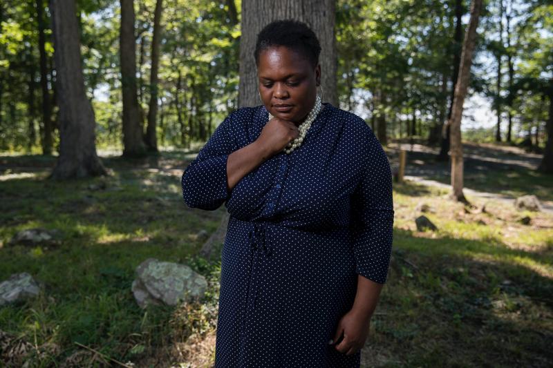 Thomas poses for a portrait at the African American Burial Ground for the Enslaved at Belmont. Thomas restored the graveyard and then used it to bury her teenage son when he drowned in June. Thomas poses for a portrait at the African American Burial Ground for the Enslaved at Belmont. Thomas restored the graveyard and then used it to bury her teenage son when he drowned in June.