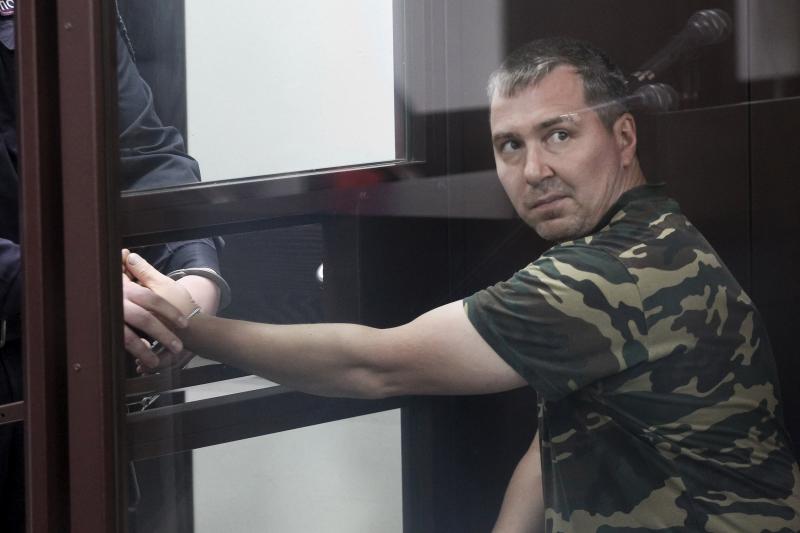 Alexander Popov, who was arrested on suspicion of murder in the death of Catherine Serou, sits behind the glass in a courtroom in the Russian city of Gorodets on June 20. Alexander Popov, who was arrested on suspicion of murder in the death of Catherine Serou, sits behind the glass in a courtroom in the Russian city of Gorodets on June 20.