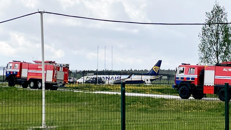 A Ryanair Boeing is parked at Minsk International Airport on Sunday. Belarusian opposition activist Roman Protasevich was detained at Minsk airport after his Lithuania-bound flight made an emergency landing. A Ryanair Boeing is parked at Minsk International Airport on Sunday. Belarusian opposition activist Roman Protasevich was detained at Minsk airport after his Lithuania-bound flight made an emergency landing.