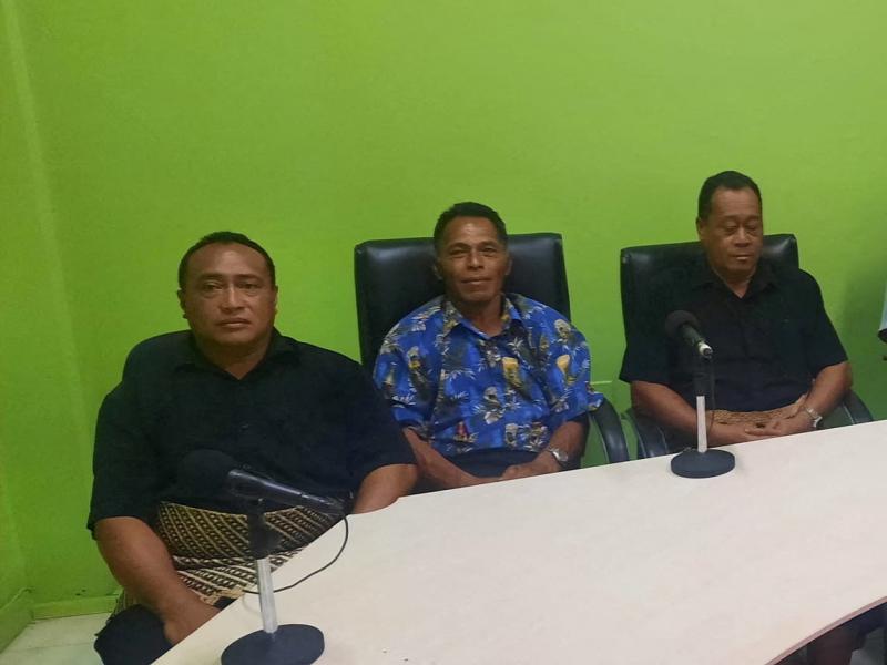 Lisala Folau (wearing blue printed shirt) says he swam for more than 24 hours after getting swept to sea by Saturday's tsunami, sits with other people of Atata island in Nuku'alofa, Tonga, on Wednesday in this picture obtained from social media. Lisala Folau (wearing blue printed shirt) says he swam for more than 24 hours after getting swept to sea by Saturday's tsunami, sits with other people of Atata island in Nuku'alofa, Tonga, on Wednesday in this picture obtained from social media.
