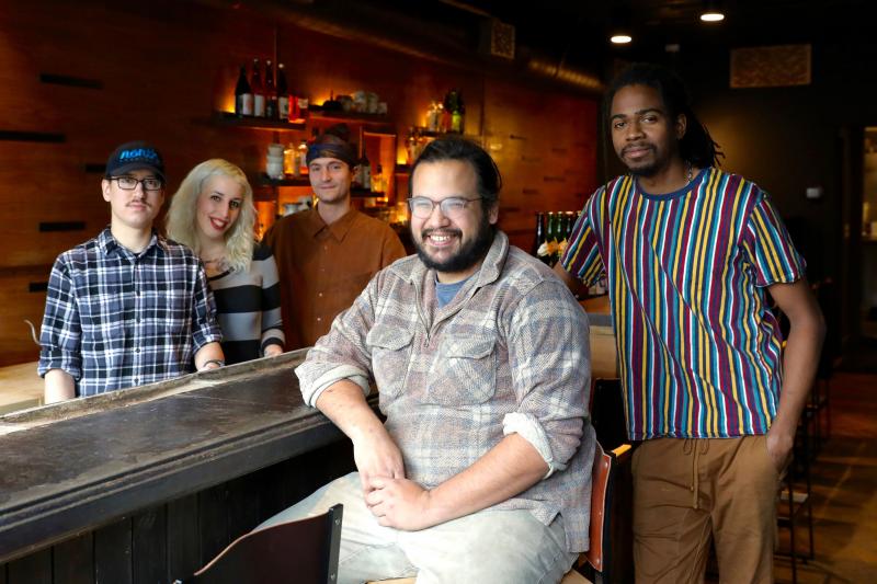 James Mark (center) inside his restaurant Big King, along with cooks (from left) Oscar Lange, Emily Joslyn, Peter Kachmarsky and JC Kuvaszko. Mark employs fewer than 50 people so isn't required to provide health benefits. But it helps with staff retention James Mark (center) inside his restaurant Big King, along with cooks (from left) Oscar Lange, Emily Joslyn, Peter Kachmarsky and JC Kuvaszko. Mark employs fewer than 50 people so isn't required to provide health benefits. But it helps with staff retention