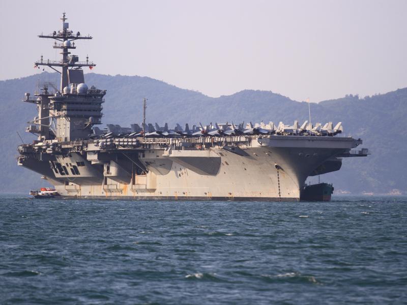 The USS Carl Vinson (CVN-70), the U.S. Navy's nuclear-powered Nimitz-class aircraft carrier, anchored off the coast in Danang, Vietnam on Monday. The USS Carl Vinson (CVN-70), the U.S. Navy's nuclear-powered Nimitz-class aircraft carrier, anchored off the coast in Danang, Vietnam on Monday.