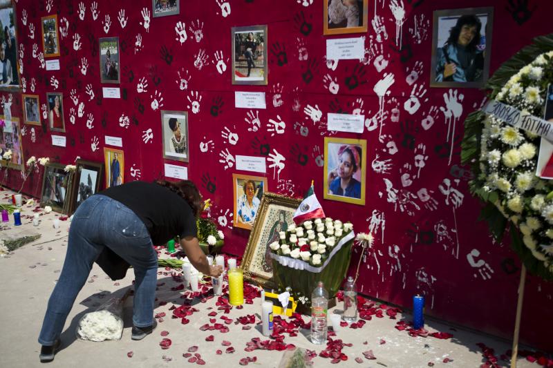 A memorial to the nine people killed when unit 1C at the Multifamiliar Tlalpan housing complex collapsed, one month after the magnitude 7.1 quake. A memorial to the nine people killed when unit 1C at the Multifamiliar Tlalpan housing complex collapsed, one month after the magnitude 7.1 quake.