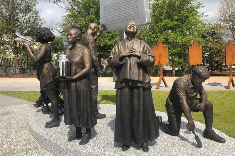 Artist Branly Cadet's Arise sculpture at the National Memorial for Peace and Justice in Montgomery, Ala., portrays community activists. Artist Branly Cadet's Arise sculpture at the National Memorial for Peace and Justice in Montgomery, Ala., portrays community activists.