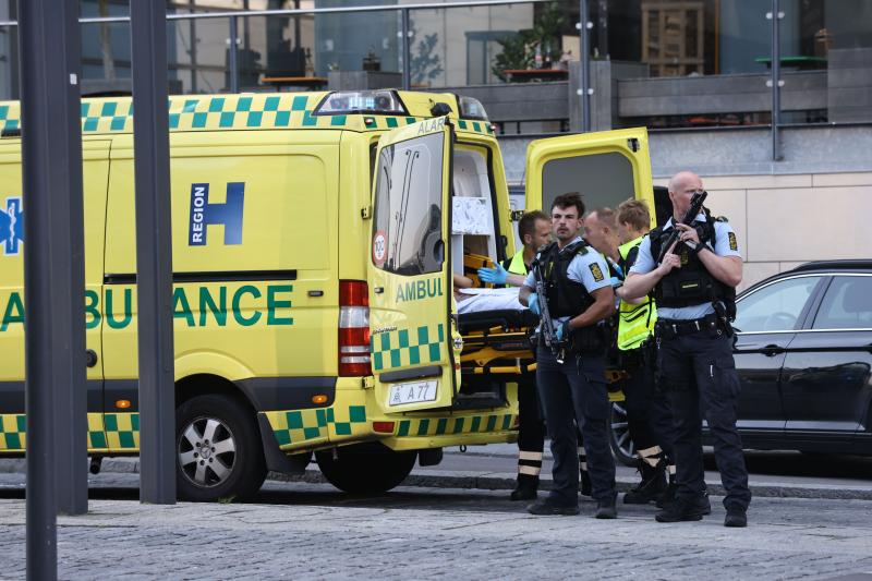 Armed police and an ambulance are seen outside the Field's shopping center in Orestad, Copenhagen, Denmark, on Sunday. Armed police and an ambulance are seen outside the Field's shopping center in Orestad, Copenhagen, Denmark, on Sunday.