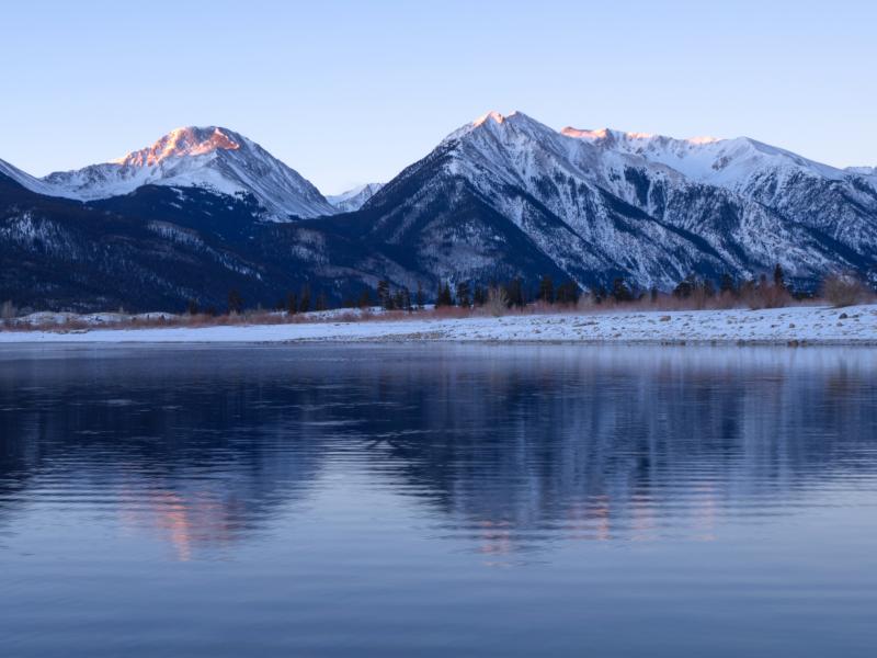 Mount Elbert, the tallest peak in the Rocky Mountains, is seen here reflected in Twin Lakes near Leadville, Colo. A hiker on the mountain didn't answer rescuers' phone calls because the number was unfamiliar. Mount Elbert, the tallest peak in the Rocky Mountains, is seen here reflected in Twin Lakes near Leadville, Colo. A hiker on the mountain didn't answer rescuers' phone calls because the number was unfamiliar.