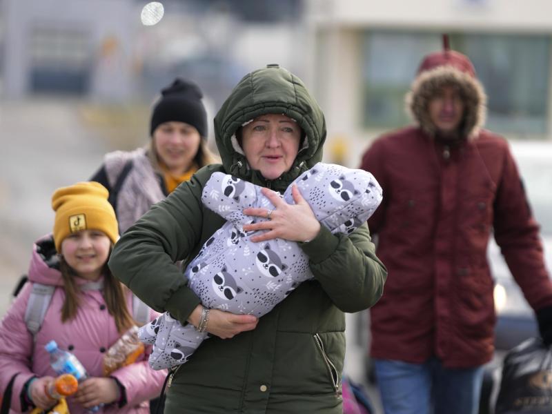 A family arrives at the border crossing in Medyka, Poland, on Wednesday after fleeing from Ukraine. The U.N. refugee agency said Tuesday that 1 million people have fled Ukraine for neighboring countries since the Russian invasion began. A family arrives at the border crossing in Medyka, Poland, on Wednesday after fleeing from Ukraine. The U.N. refugee agency said Tuesday that 1 million people have fled Ukraine for neighboring countries since the Russian invasion began.
