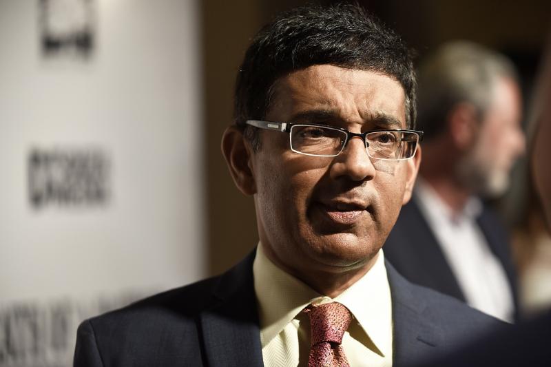 Dinesh D'Souza, seen here at a premiere of one of his films in 2018, has released a new film alleging voter fraud in the 2020 presidential election. Fact checkers have cast doubt on many of the film's claims. Dinesh D'Souza, seen here at a premiere of one of his films in 2018, has released a new film alleging voter fraud in the 2020 presidential election. Fact checkers have cast doubt on many of the film's claims.