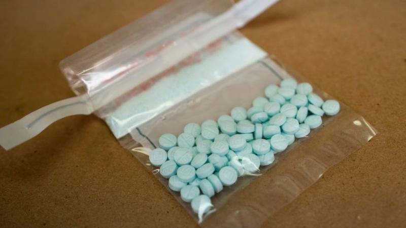 Tablets believed to be laced with fentanyl are displayed at a Drug Enforcement Administration lab in New York in 2019. The Biden administration is hoping to crack down on abuse of synthetic opioids in part by putting them in the most restricted category o Tablets believed to be laced with fentanyl are displayed at a Drug Enforcement Administration lab in New York in 2019. The Biden administration is hoping to crack down on abuse of synthetic opioids in part by putting them in the most restricted category o