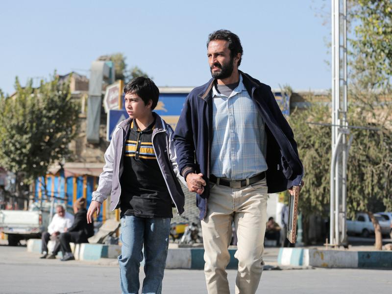Rahim (Amir Jadidi) tries to reconnect with his son (Saleh Karimai) in A Hero. Rahim (Amir Jadidi) tries to reconnect with his son (Saleh Karimai) in A Hero.