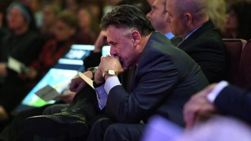 Columbine Principal Frank DeAngelis listens to his students, survivors of the shooting, in April 2019 as he attends "Columbine 20 Years Later: A Faith-based Remembrance Service" at Waterstone Community Church in Littleton, Colo. A dozen students and one t Columbine Principal Frank DeAngelis listens to his students, survivors of the shooting, in April 2019 as he attends "Columbine 20 Years Later: A Faith-based Remembrance Service" at Waterstone Community Church in Littleton, Colo. A dozen students and one t