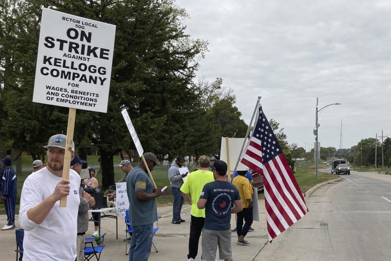 Workers from a Kellogg cereal plant picket along the main rail lines leading into the facility on Oct. 6 in Omaha, Neb. Workers have gone on strike after a breakdown in contract talks with company management. Workers from a Kellogg cereal plant picket along the main rail lines leading into the facility on Oct. 6 in Omaha, Neb. Workers have gone on strike after a breakdown in contract talks with company management.