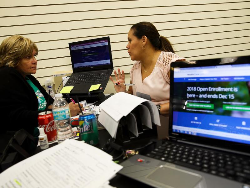 Margarita Mills (left), an insurance agent from Sunshine Life and Health Advisors, helped Daniela Morales shop for an Affordable Care Act health plan at the Mall of the Americas in Miami last month. Margarita Mills (left), an insurance agent from Sunshine Life and Health Advisors, helped Daniela Morales shop for an Affordable Care Act health plan at the Mall of the Americas in Miami last month.