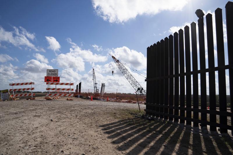 The existing border wall (right) is seen near the construction site of new wall panels south of Donna, Texas, on Nov. 20. There is widespread skepticism on the border that President Trump will get anywhere near the 450 miles of wall he wants by next Novem The existing border wall (right) is seen near the construction site of new wall panels south of Donna, Texas, on Nov. 20. There is widespread skepticism on the border that President Trump will get anywhere near the 450 miles of wall he wants by next Novem