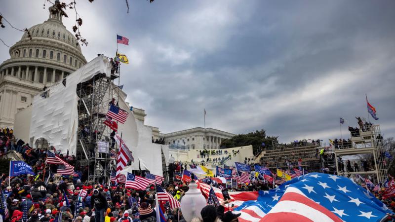 Trump supporters clash with police and security forces as people try to storm the U.S. Capitol on Jan. 6. Trump supporters clash with police and security forces as people try to storm the U.S. Capitol on Jan. 6.
