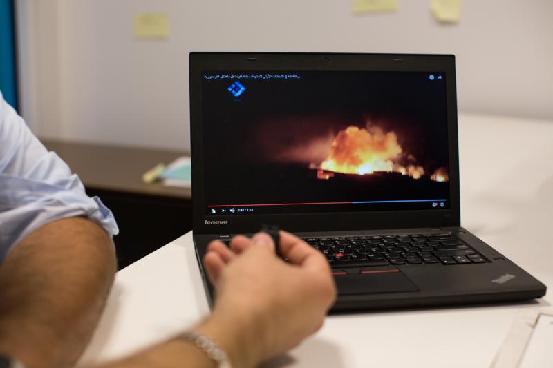 Mohammad Al Abdallah, the executive director of the Syria Justice and Accountability Centre, shows a video that was posted to YouTube of illegal cluster bombing in Syria. Mohammad Al Abdallah, the executive director of the Syria Justice and Accountability Centre, shows a video that was posted to YouTube of illegal cluster bombing in Syria.