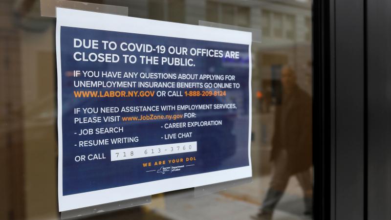 A "closed" sign is posted at the entrance of a New York State Department of Labor office in Brooklyn. With millions of people filing for unemployment benefits, state employment agencies have been overwhelmed around the country. A "closed" sign is posted at the entrance of a New York State Department of Labor office in Brooklyn. With millions of people filing for unemployment benefits, state employment agencies have been overwhelmed around the country.