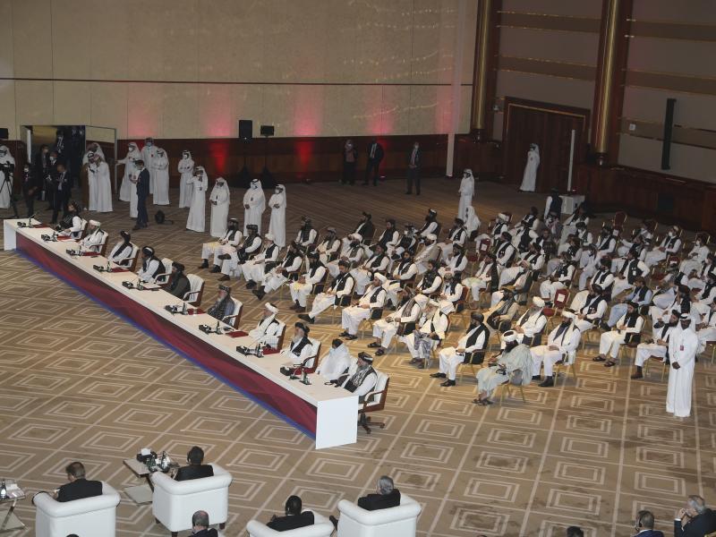 The Taliban delegation attends the opening session of the peace talks between the Afghan government and the Taliban in Doha, Qatar, on Sept. 12. The Taliban delegation attends the opening session of the peace talks between the Afghan government and the Taliban in Doha, Qatar, on Sept. 12.