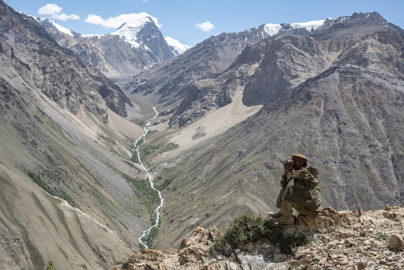 A Wakhi man looks out at the mountains in the Wakhan corridor of Afghanistan. Uyghurs leaving China have trekked through the region. Now many Uyghurs in Afghanistan fear the Taliban could deport them to China. A Wakhi man looks out at the mountains in the Wakhan corridor of Afghanistan. Uyghurs leaving China have trekked through the region. Now many Uyghurs in Afghanistan fear the Taliban could deport them to China.