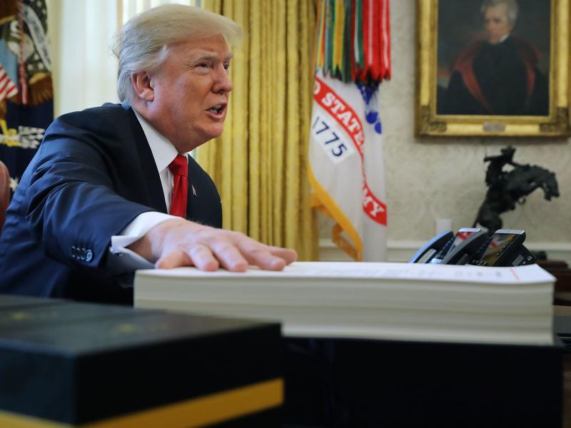 President Trump prepares to sign the tax legislation in the Oval Office on Dec. 22, 2017. The GOP tax cut did not pay for itself, as promised, nor did it deliver a sustained boost to economic growth. President Trump prepares to sign the tax legislation in the Oval Office on Dec. 22, 2017. The GOP tax cut did not pay for itself, as promised, nor did it deliver a sustained boost to economic growth.