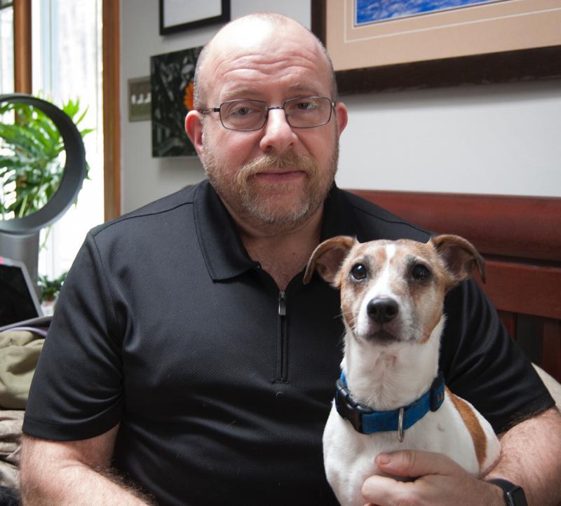Phil Gutis with his dog, Abe, who died last year. Gutis, who has Alzheimer's, hoped an experimental drug could help preserve his memories. Phil Gutis with his dog, Abe, who died last year. Gutis, who has Alzheimer's, hoped an experimental drug could help preserve his memories.