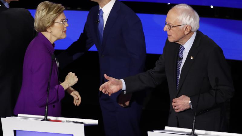 Democratic presidential candidate Sen. Elizabeth Warren, left and Sen. Bernie Sanders, I-Vt. after Tuesday's debate. Democratic presidential candidate Sen. Elizabeth Warren, left and Sen. Bernie Sanders, I-Vt. after Tuesday's debate.