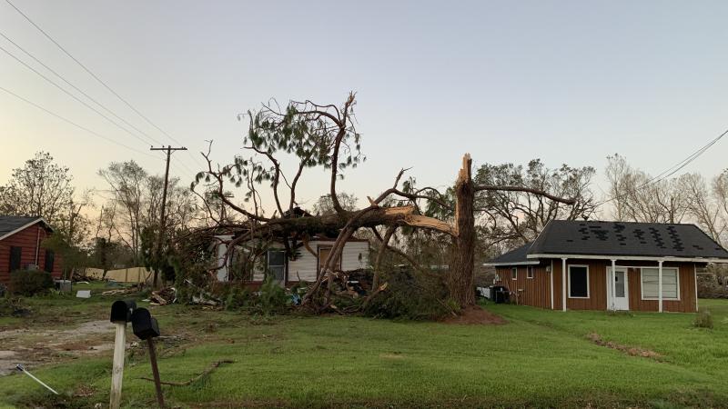 A home near Iowa, La., was crushed by a snapped tree after Hurricane Laura made landfall with 150 mph winds Thursday. The area is facing two disasters at once. A home near Iowa, La., was crushed by a snapped tree after Hurricane Laura made landfall with 150 mph winds Thursday. The area is facing two disasters at once.